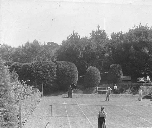The tennis court at Roxburgh st.&nbsp;Edith Zohrab (nee Wills) with the parasol, and probably Constantine being the male figure.&nbsp;